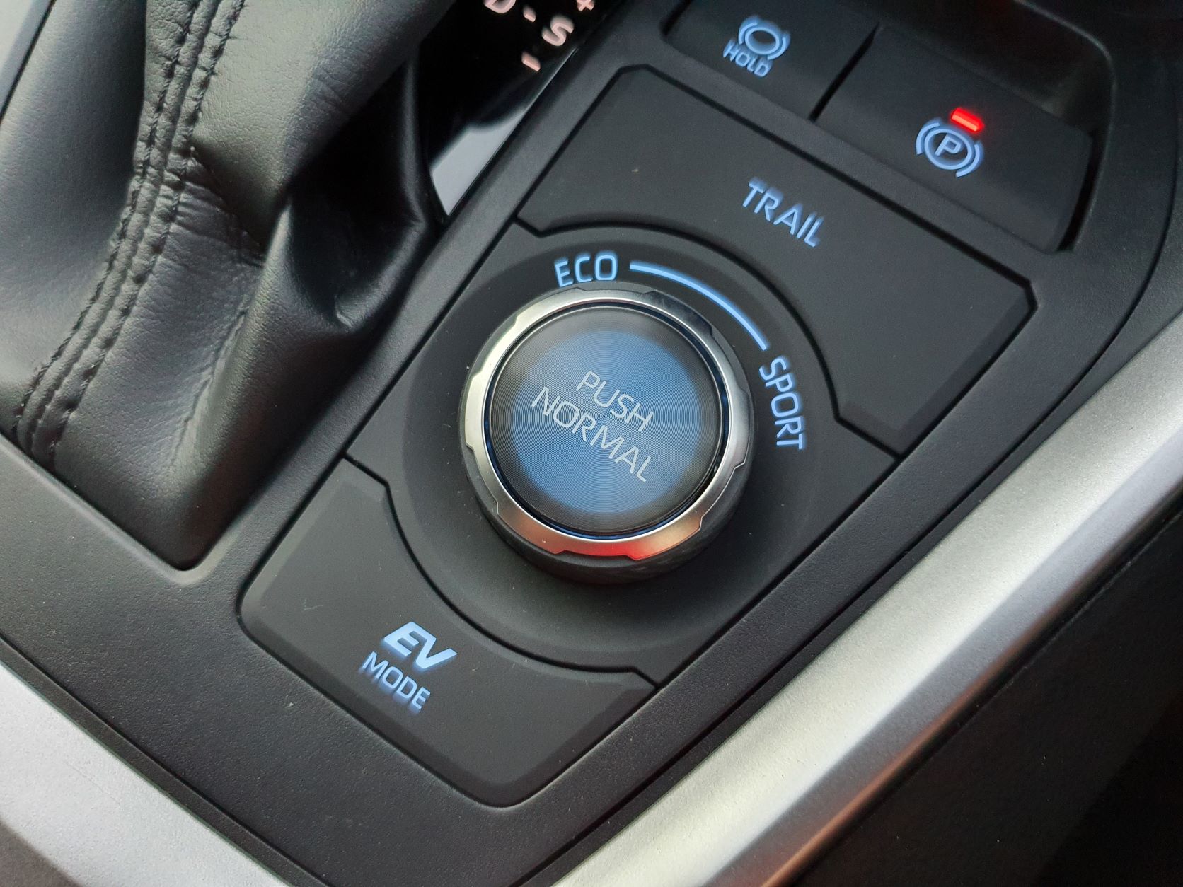 View of the normal mode button in blue in the new Toyota RAV4 Hybrid XSE