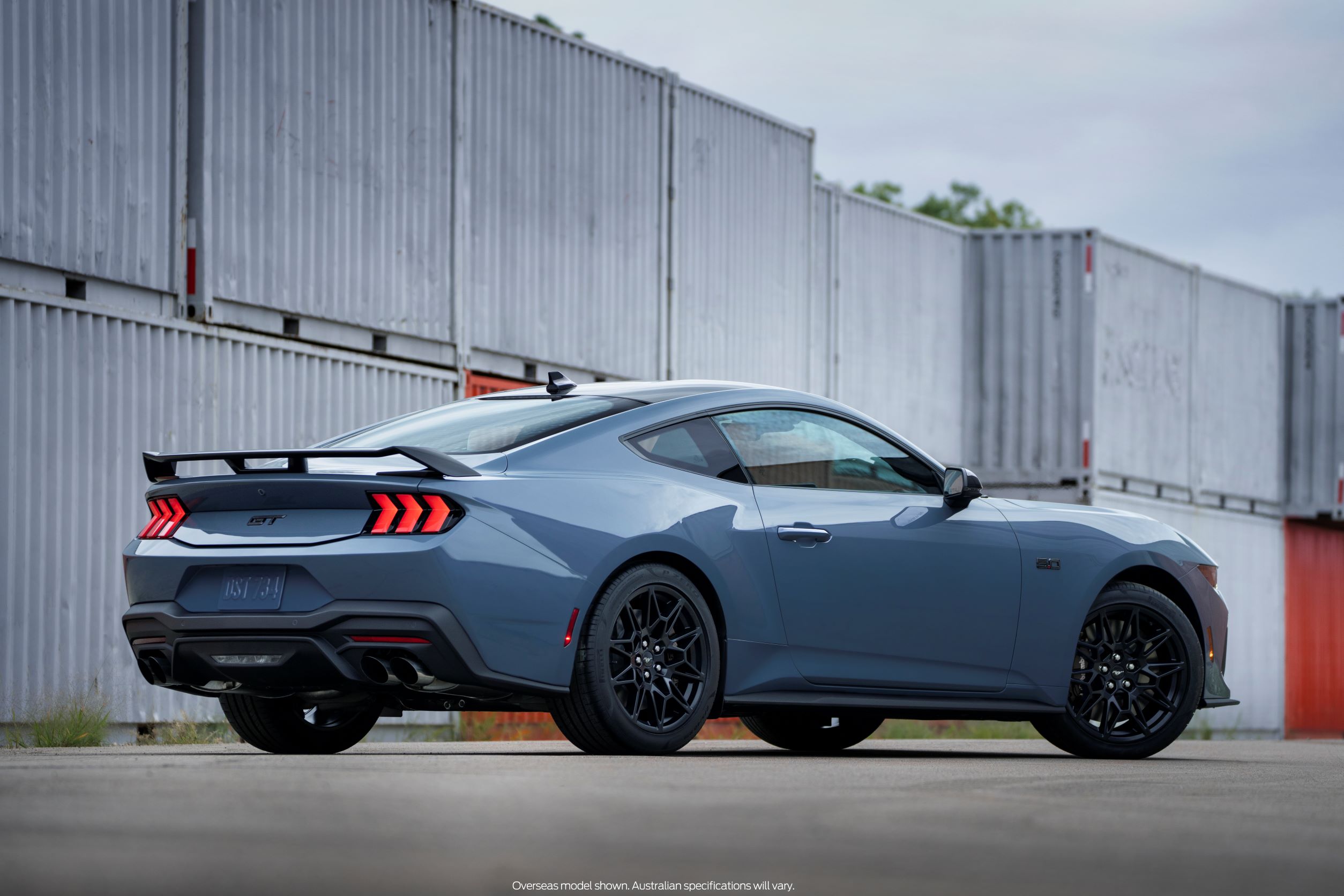 Rear three quarters view of the seventh generation 2024 Ford Mustang GT
