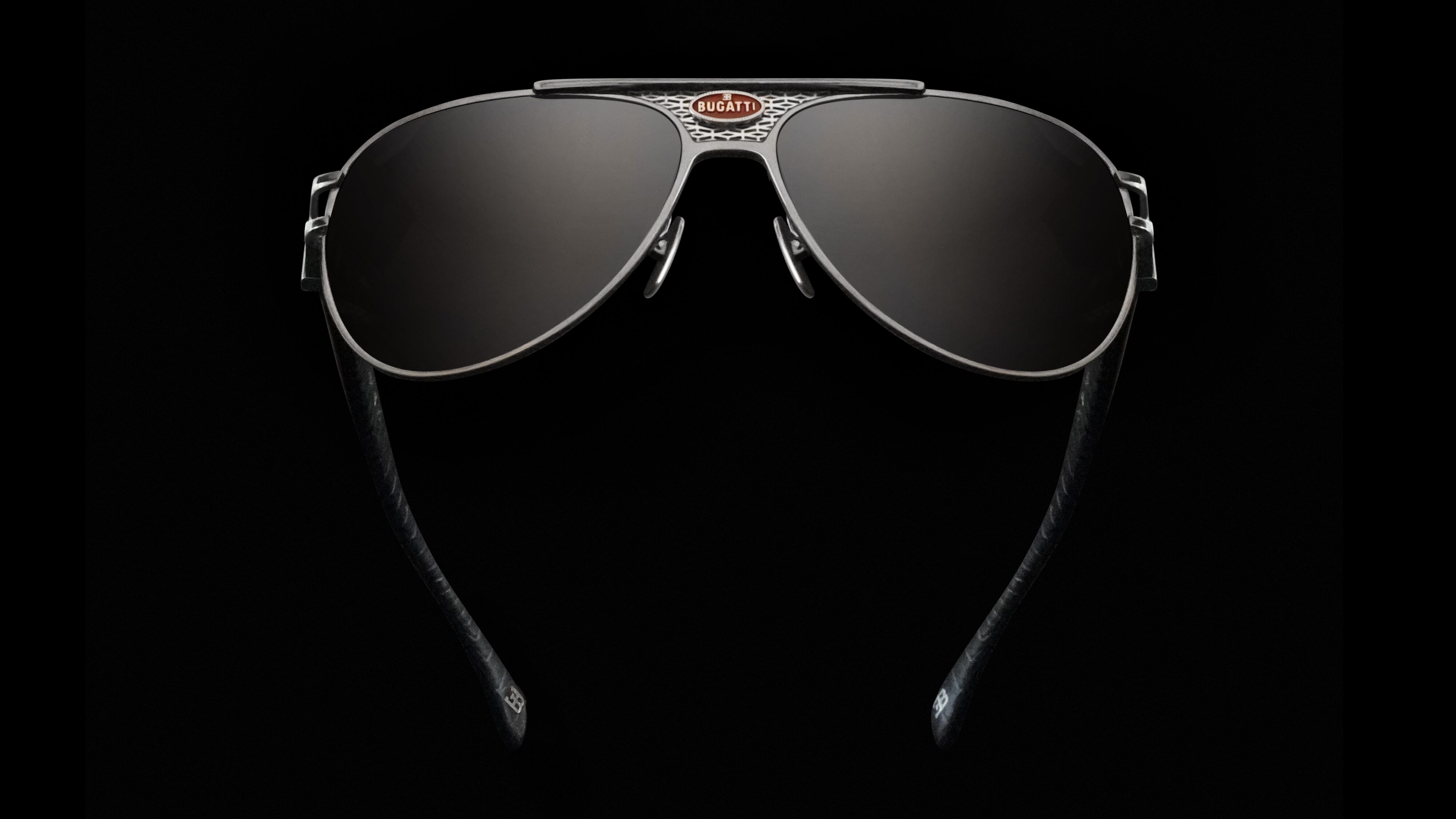 Number 11 from the Bugatti Eyewear collection features 925 Sterling Silver and embossed leather temples.