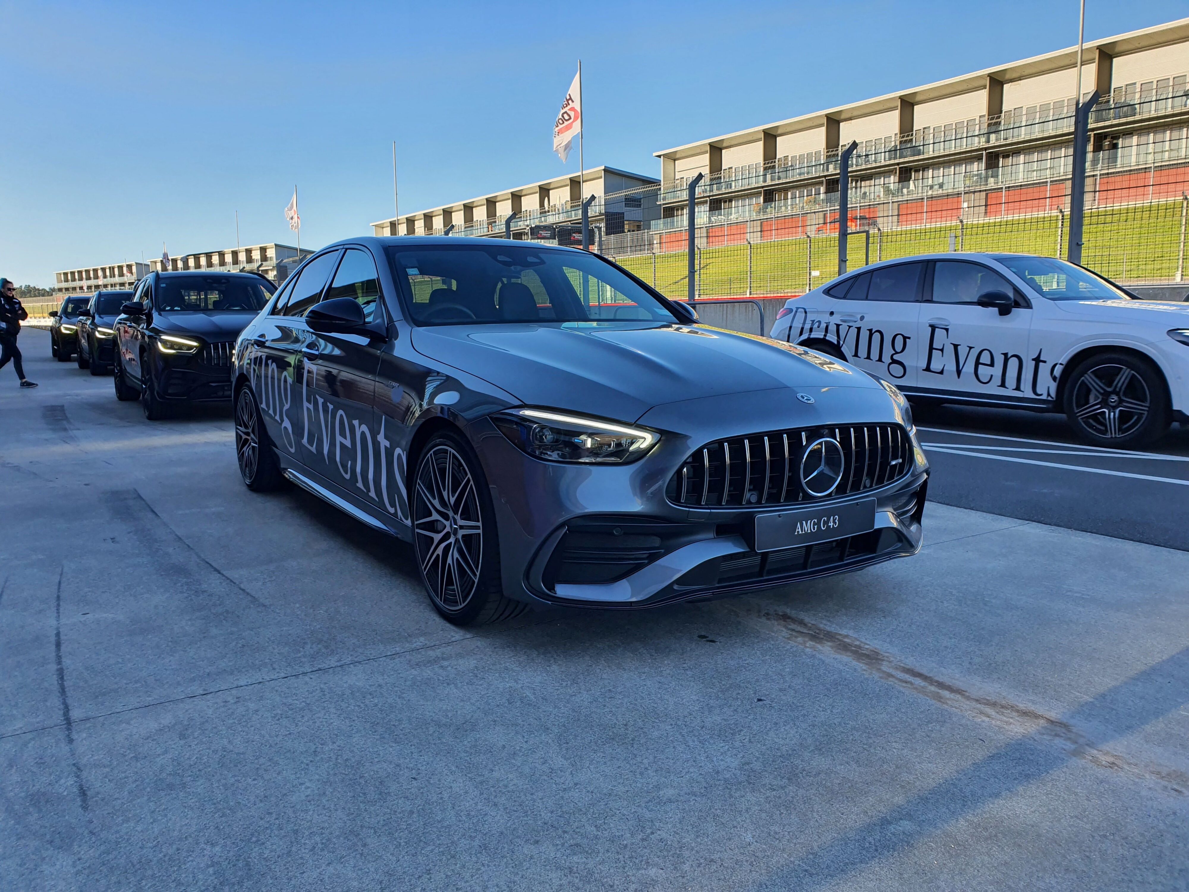A Mercedes-Benz C43 AMG in the foreground with other Mercedes-Benz cars in the background at the Mercedes Driving Events programme held at Hampton Downs Motorsport Park NZ.