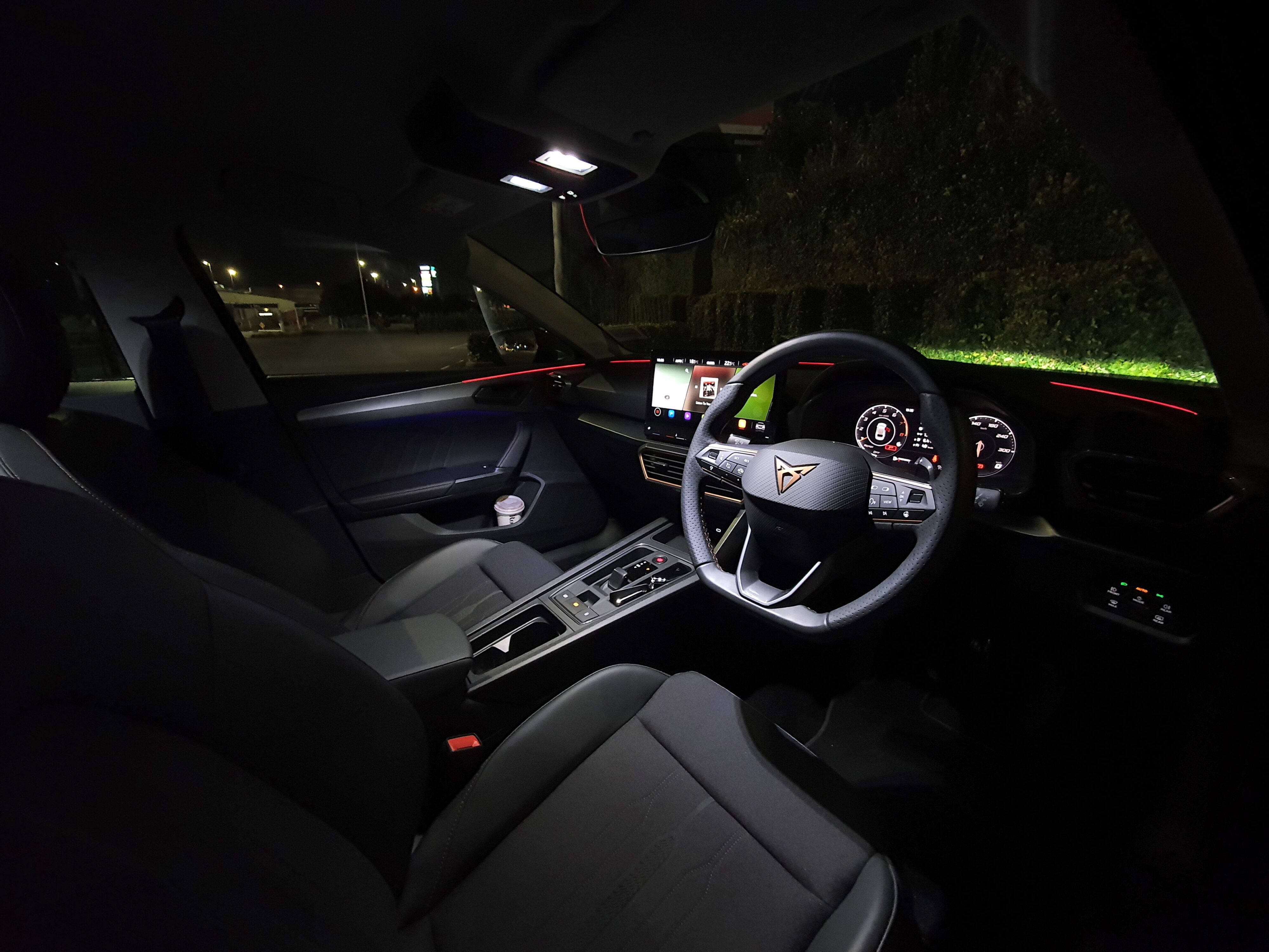 Interior of a 2023 Cupra Leon V Sports Tourer, photographed at night.