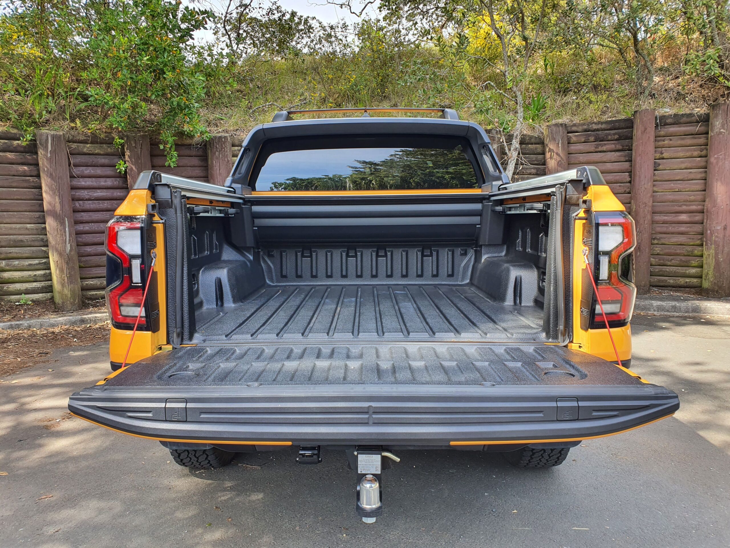 A view down the truck bed of a 2023 Ford Ranger Wildtrak X in Cyber Orange.