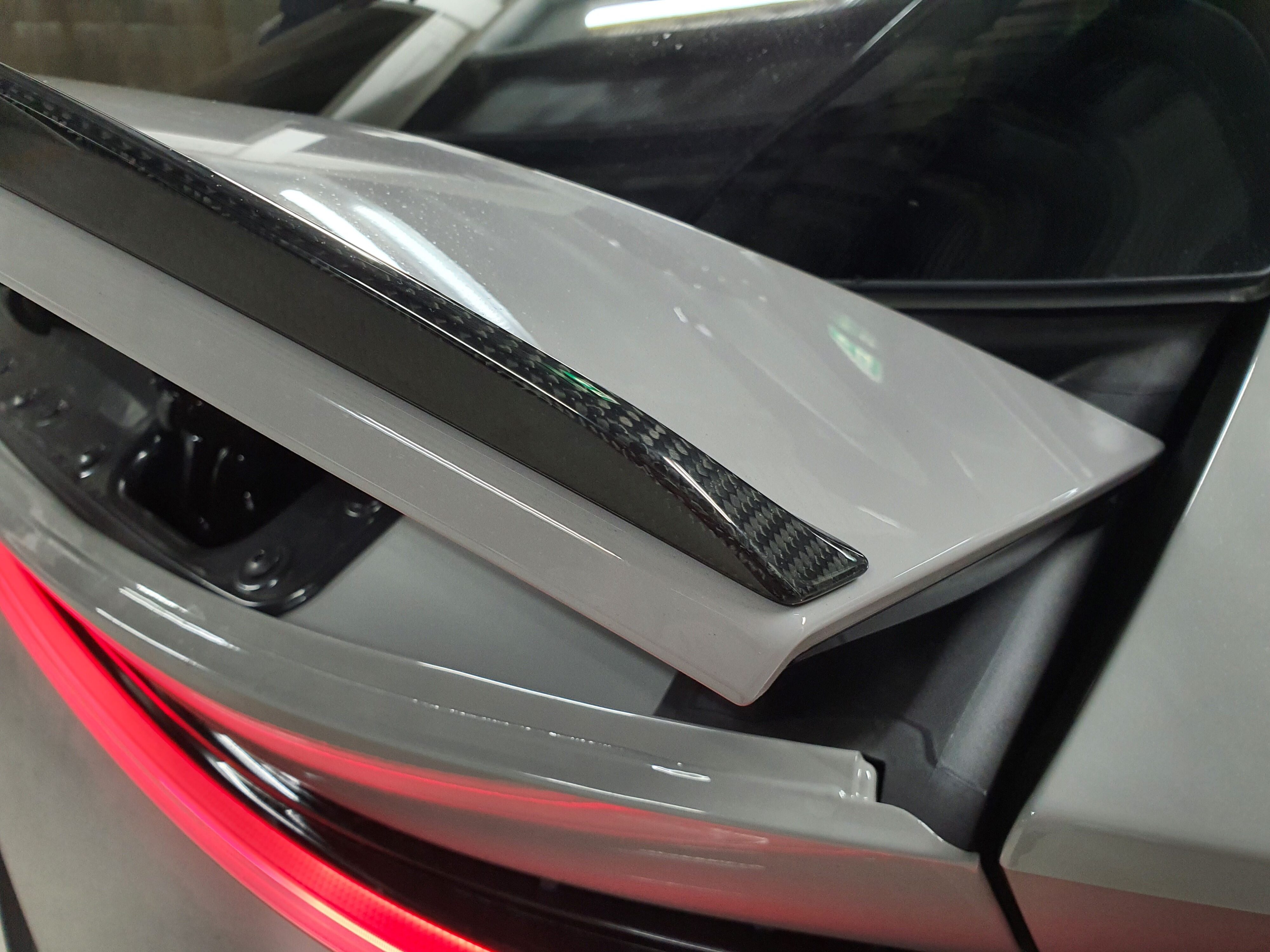 Carbon fibre tip on the electronically adjustable rear wing on a 2024 Lotus Eletre R.