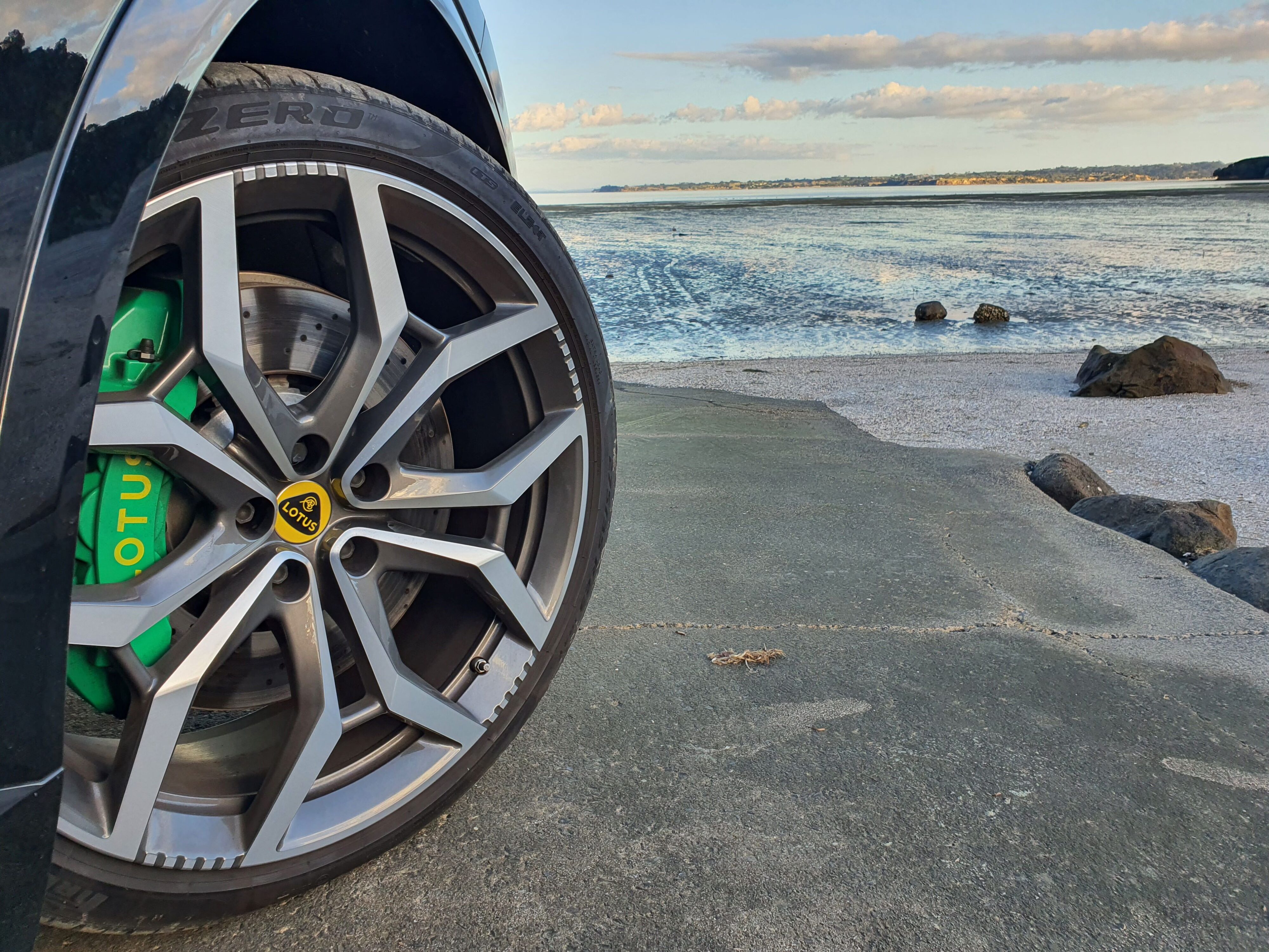 23 inch wheels of a Lotus Eletre S with green brake calipers.