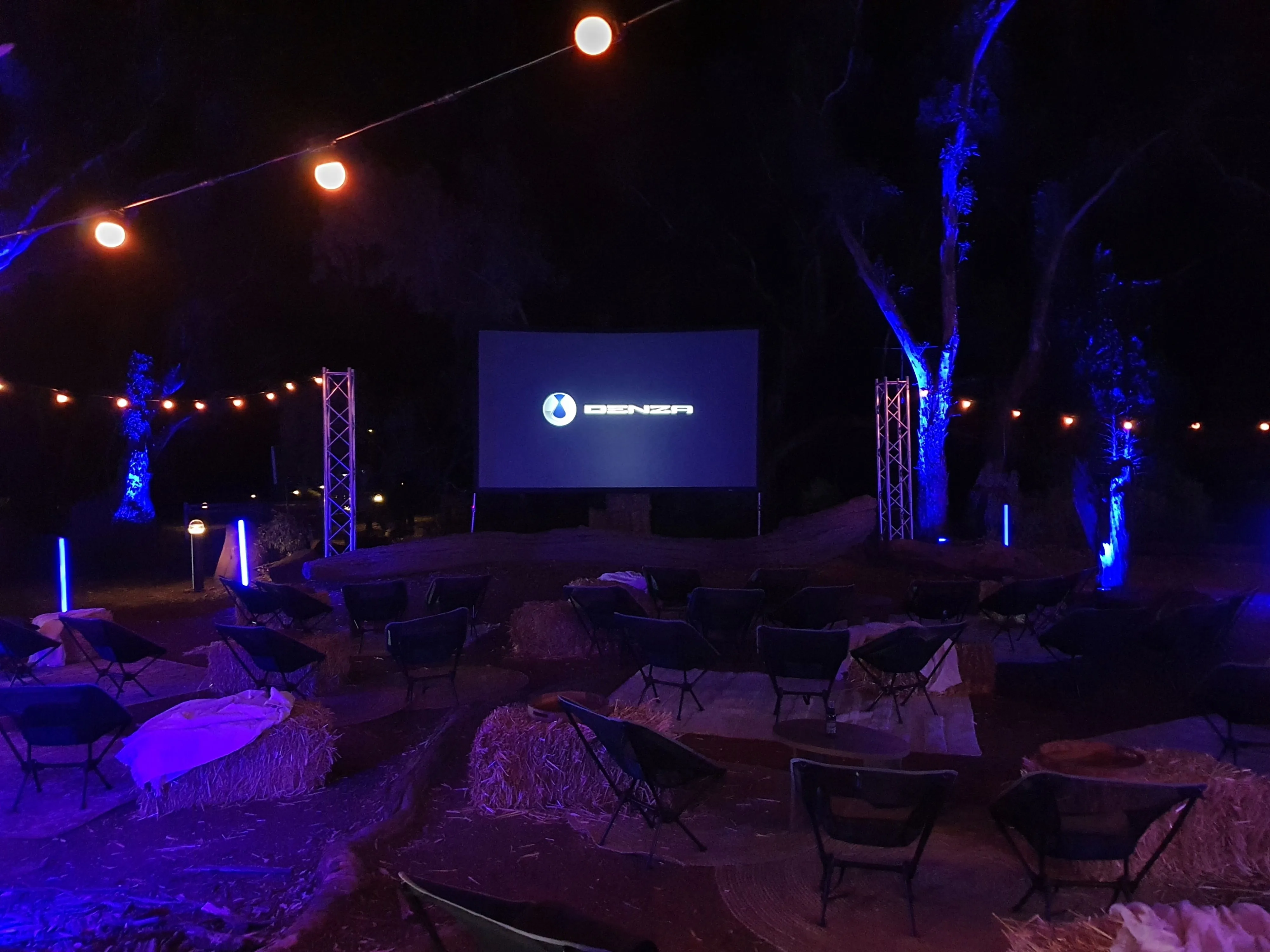 A DENZA powered outdoor movie theater at the Wilpena Pound Resort during the Australia New Zealand launch of the brand and B5 & B8 models.