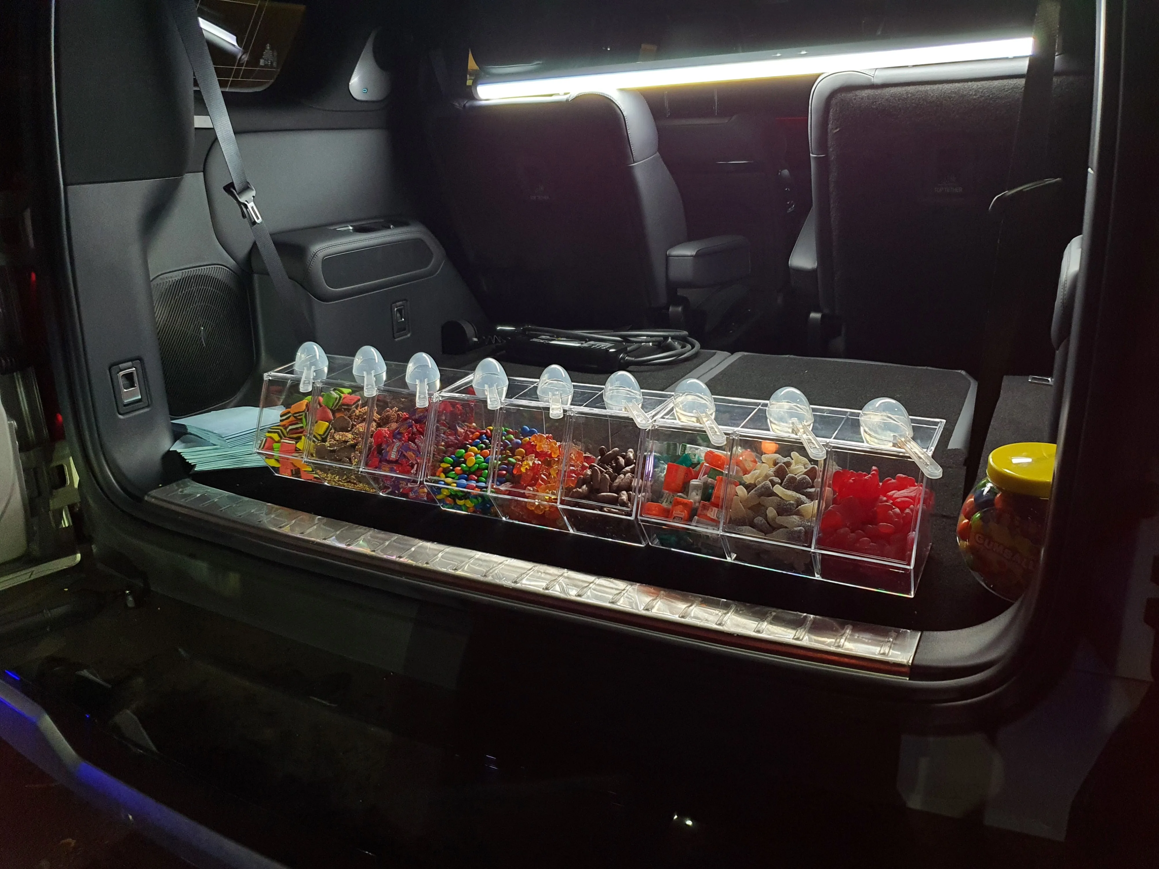 Photo of a DENZA powered lighting and lolly dispenser during the Australia New Zealand launch of the brand and B5 & B8 models.
