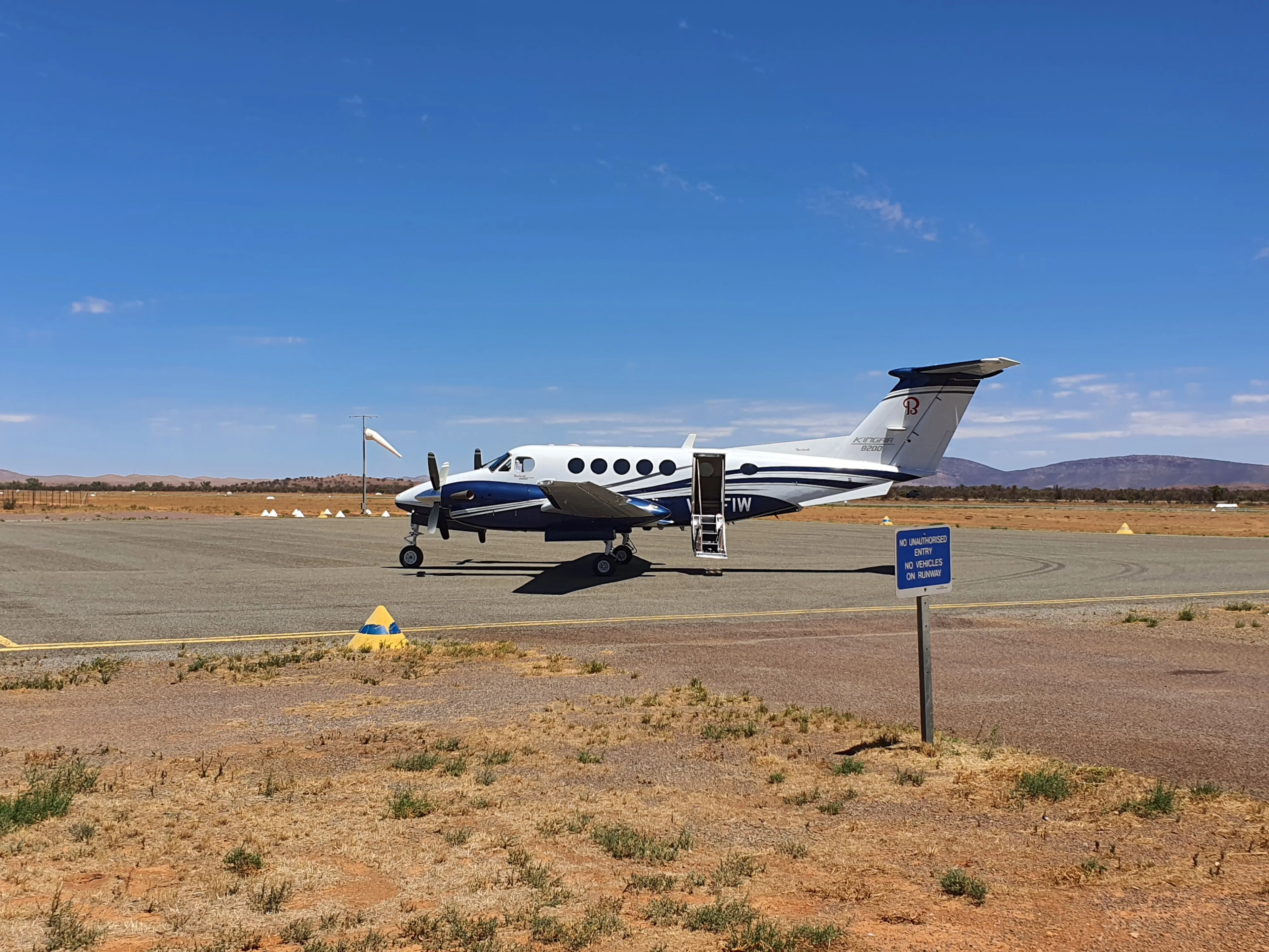 An 8 seater twin propeller airplane readying for take-off at Hawker Airport during the Australia New Zealand launch of the DENZA brand and B5 & B8 models.