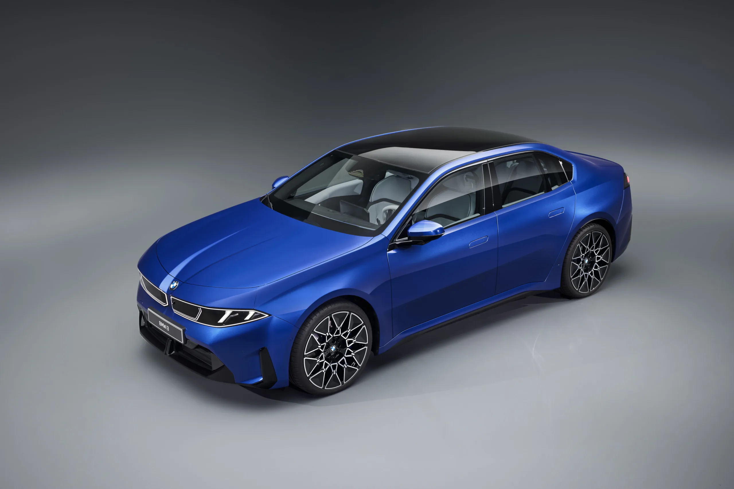 BMW reveals all-electric i3 sedan with 900km range