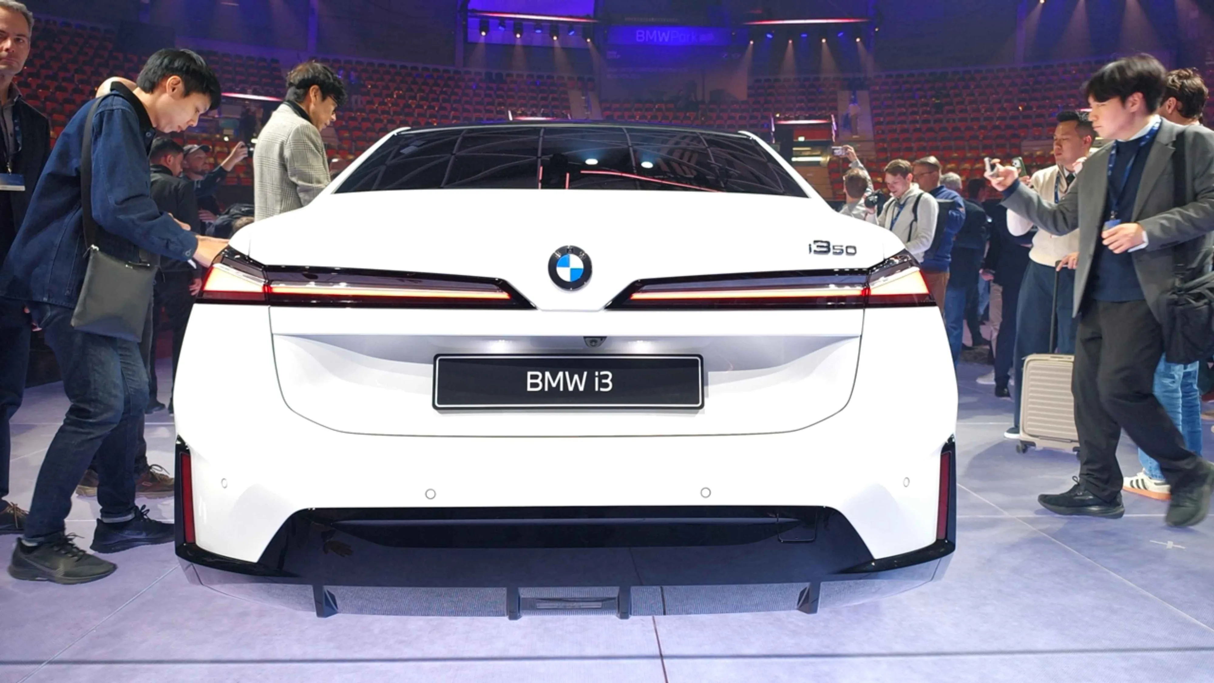BMW reveals all-electric i3 sedan with 900km range